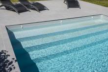 Notre zone d'activité pour ce service Constructeur de piscines traditionnelles avec terrasse en pierre naturelle